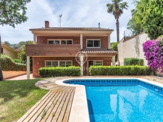 Bright house with views and a garden with a swimming pool for sale in Castelldefels